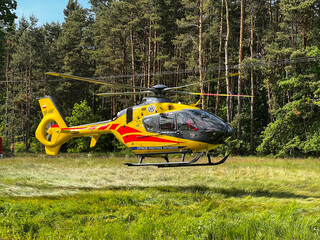 Kalety, Poland, June 5, 2023: An ambulance helicopter renders aid to a person injured as a result of a fall from a height.