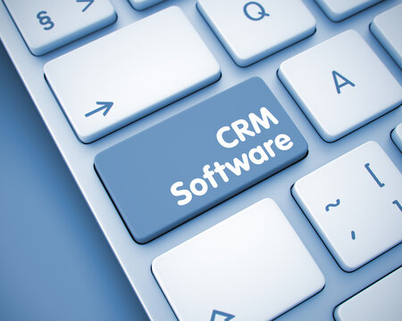 Business Concept: CRM Software on the Modern Laptop Keyboard lying on the Toned Background. Online Service Concept: CRM Software on the Conceptual Keyboard Background. 3D Illustration.