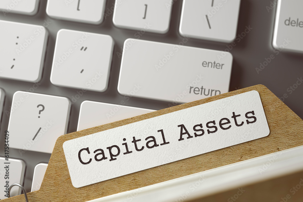 Poster card index with capital assets concept on background of modern keyboard. business concept. closeup v