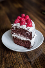 piece of chocolate cake with raspberries