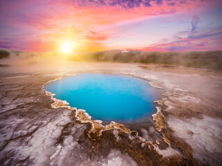 Fototapeta premium Incredibly blue pool Blahver at Hveravellir is actually a hot geothermal spring in the heart of Iceland. Photo taken around midnight sunset
