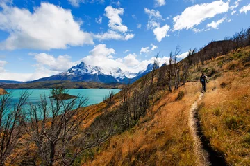 Papier Peint photo Cuernos del Paine family of two, father and son, enjoying hiking and active travel in torres del paine national park in patagonia, chile, view of cuernos del paine and pehoe lake