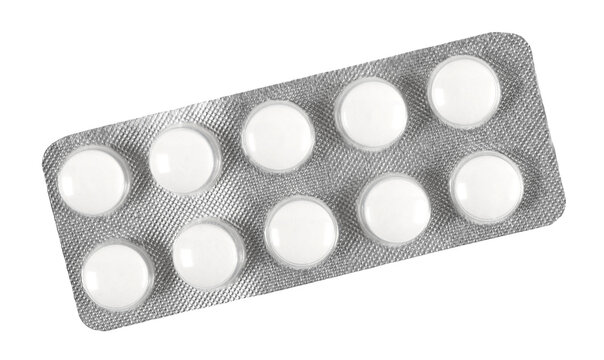 Tablets in strip isolated on white, top view