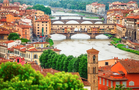 River Arno Florence with bridge Ponte Vecchio and roofs of old town