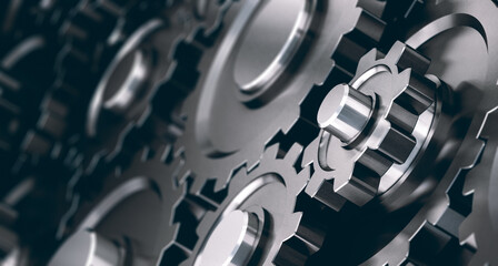 3D illustration of gears with depth of field, horizontal orientation.