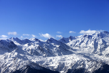 Fototapeta na wymiar Snow winter mountains in nice sunny day. Caucasus Mountains. Svaneti region of Georgia.