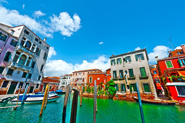 Fototapeta na wymiar The Narrow Canal- the Street in Venice