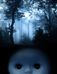 Vintage evil spooky doll and mysterious landscape of foggy forest