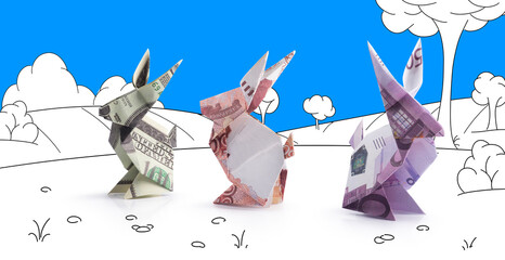 hares origami from the banknote in a landscape