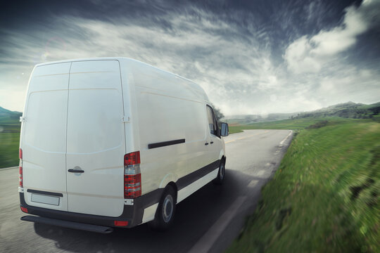 White truck on the road with the natural landscape . 3D Rendering