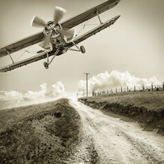 vintage biplane against the sky © Designpics