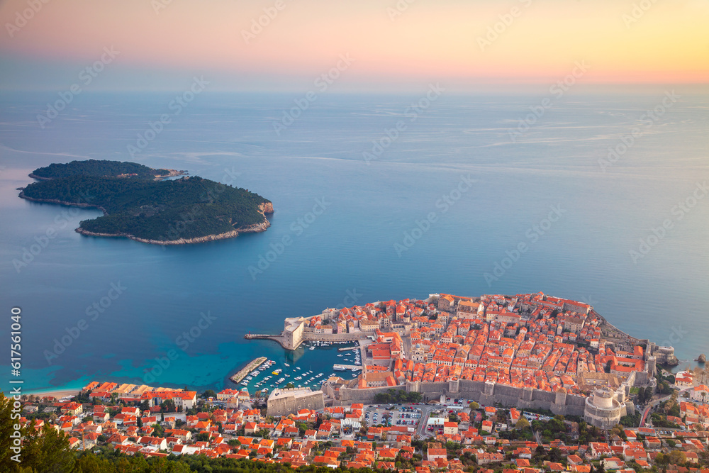 Wall mural beautiful romantic old town of dubrovnik during sunset.