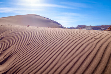 Fototapeta na wymiar Sand dunes landscape in Valle de la Luna, San Pedro de Atacama, Chile