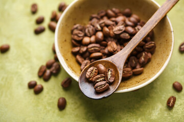 Fresh coffee beans in a bowl. Selective focus
