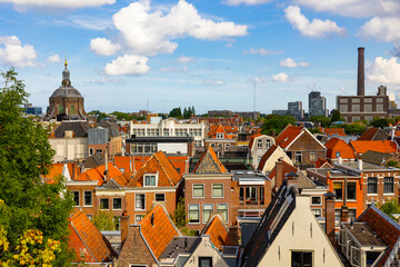 View from above of historic center of Dutch city of Leiden on sunny day overlooking typical...