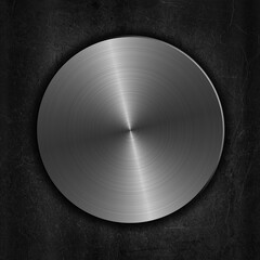 Silver brushed metal button on a grunge background