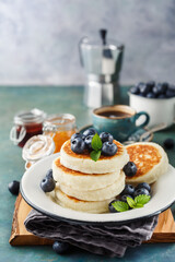 Cottage cheese pancakes with fresh blueberries and coffee, Delicious Breakfast