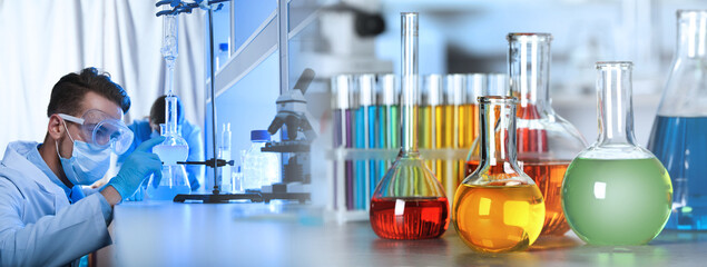 Chemistry and chemical research. Collage of laboratory glassware and scientist working with liquid....