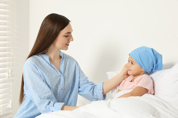 Fototapeta premium Childhood cancer. Mother and daughter in hospital