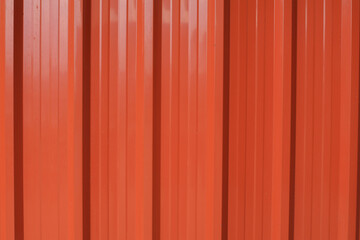 Container metal orange wall texture background. Color panel red-orange color building facade. Decor...