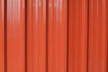 Obraz premium Container metal orange wall texture background. Color panel red-orange color building facade. Decor and exterior design.