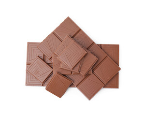 Pieces of delicious milk chocolate bars isolated on white, top view