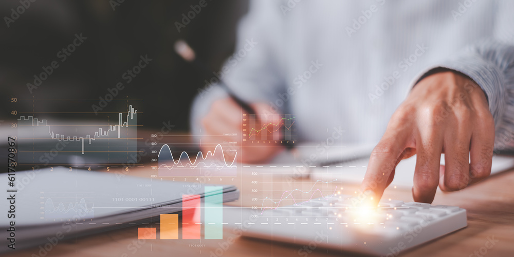 Leinwandbilder statistical analyst using calculator calculate and read reports graphs and charts ,statistical reading graph report and business statistics charts ,Analysis and improvement ,growth graph