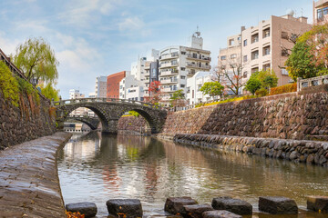 Nagasaki, Japan - Nov 29 2022: Meganebashi Bridge is the most remarkable of several stone bridges....
