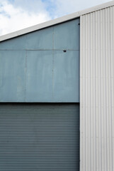 Obraz na płótnie Canvas Blue and White Warehouse Wall.
