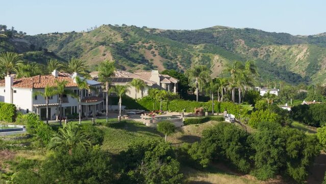 Amazing high-end residential house settled on top of a grassy area. Beautiful home of the Calabasas Park Estates with luxurious estate properties with canyon views. High quality 4k footage