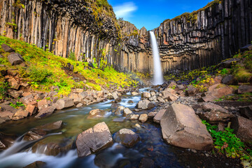 Svartifoss waterfall surrounded by basalt columns in the south of Iceland