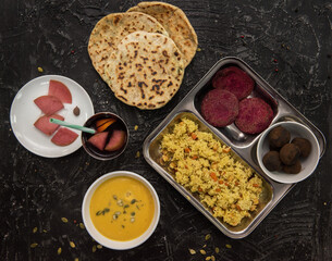 Vegetarian food: pea soup, pilaf, flat cakes, beet cutlets, pumpkin seeds and compote of pickled pears