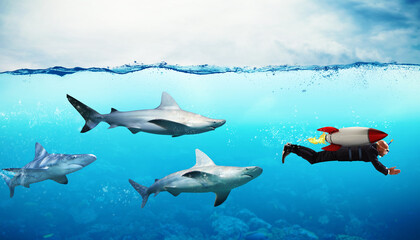 Concept of competition with businessman who escapes from sharks with rocket
