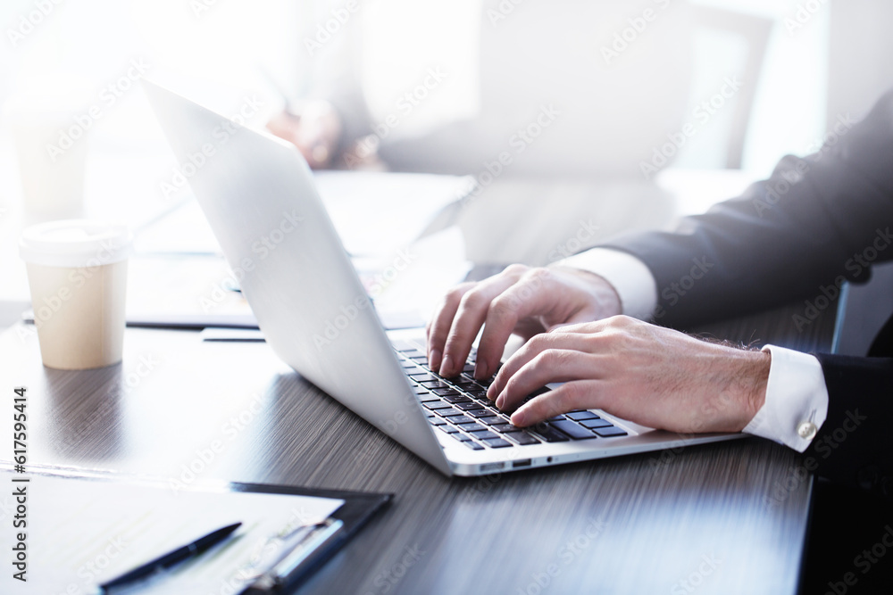 Poster man working on a laptop in office. concept of internet sharing and interconnection