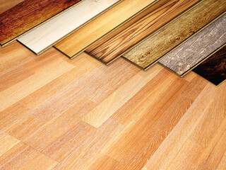 Obraz na płótnie Canvas New planks of oak parquet of different colors on wooden floor. 3d render