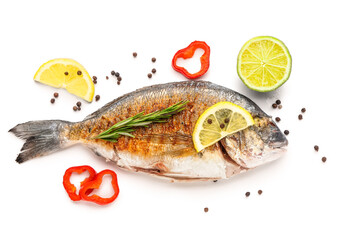 Tasty grilled dorado fish with lemon on white background