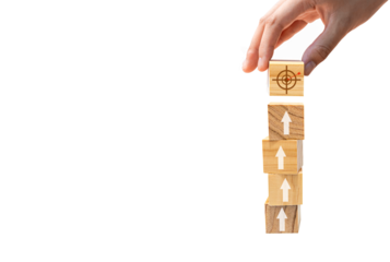 Place wooden blocks as a step towards the goal on wooden table. Business ideas for successful growth process.PNG