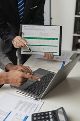 Business documents on the background of employees, planning work in meetings, young colleagues working together on projects, starting new in a modern office. Businessmen brainstorm ideas vertical, 