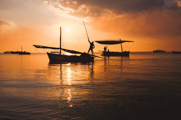 The Fisherman Sailing for fish in the middle of the sea in the morning at Mozambique.