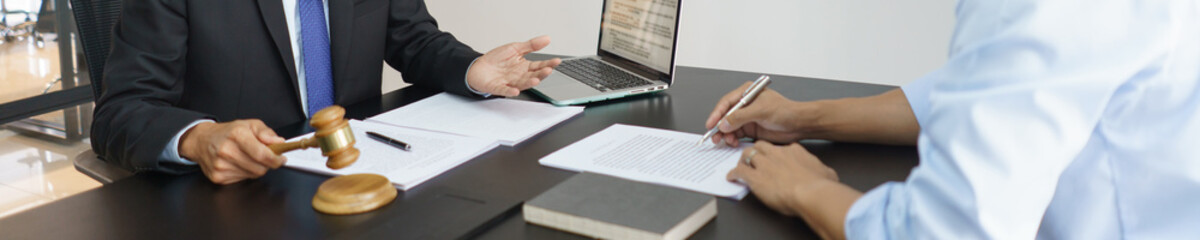 Concept of lawyer counseling, Senior lawyer gives businessman legal advice over a business contract