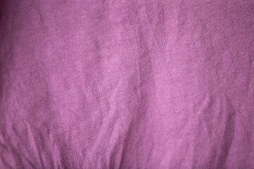 Purple wrinkled fabric. Abstract background and texture for design.