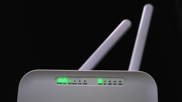 white colour wifi router power testing in closeup led blink network  power on off