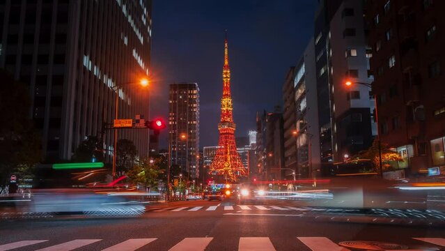 Time lapse of Tokyo Tower with Tokyo skyline cityscape at dusk.
