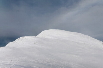 Fototapeta na wymiar Snowy mountain views in winter