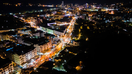 Obraz premium High angle view of Patong Road at night, an important tourist attraction in Thailand where everyone comes to party. fun Can travel both day and night