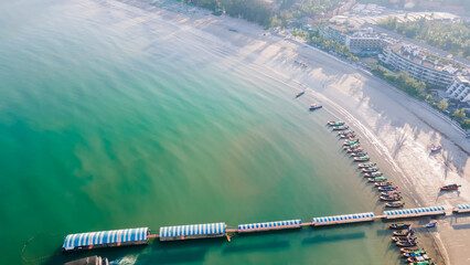 Drone Camera Aerial view of Patong town in Phuket, Thailand. The sea is beautiful in the summer,...