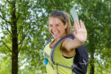 female hiker going to do high five