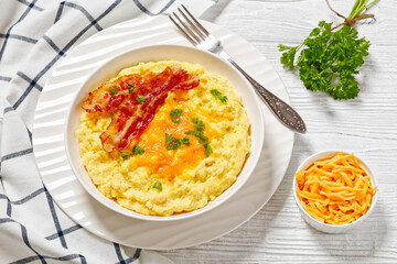 Cheddar Cheese Grits Casserole with bacon slices