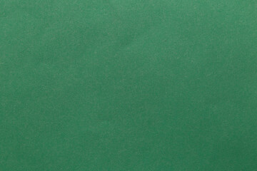 Green paper sheet texture cardboard background.