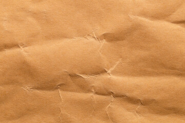 Brown color eco recycled kraft paper sheet texture cardboard background.